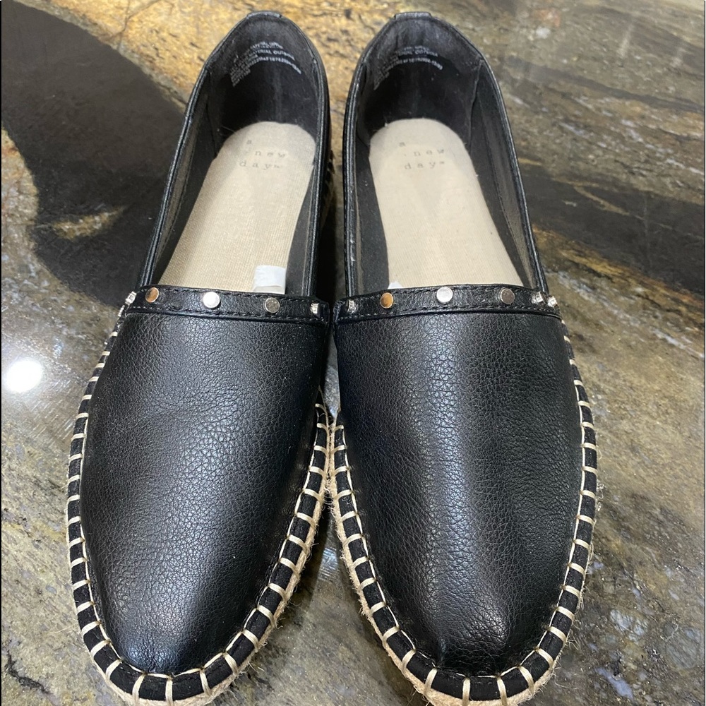 Black leather loafers